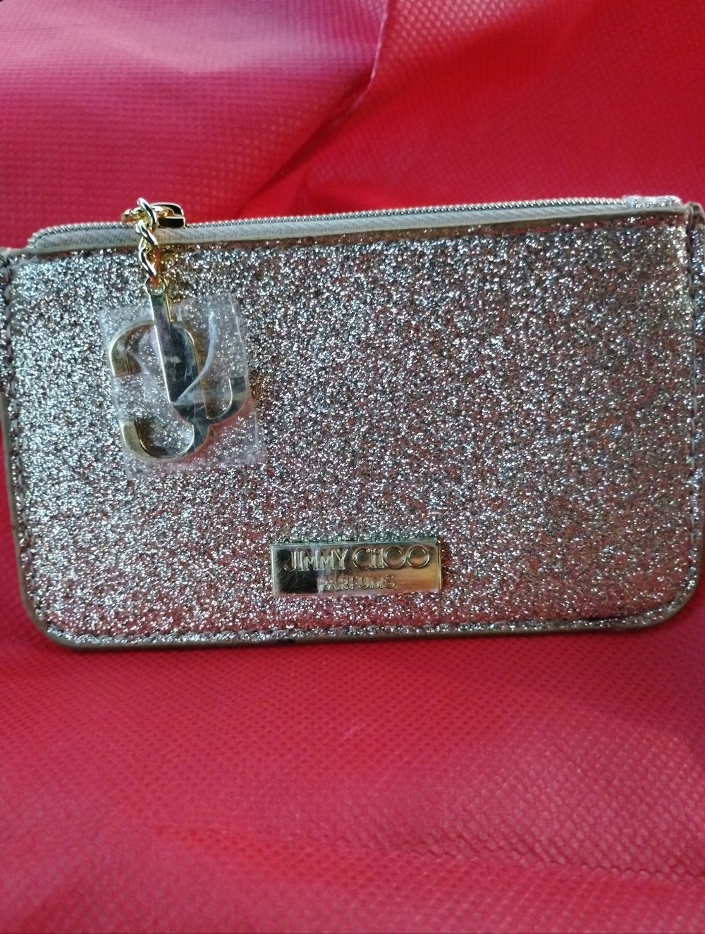 Jimmy Choo Silver Glitter Clutch Wristlet with Gold Accents